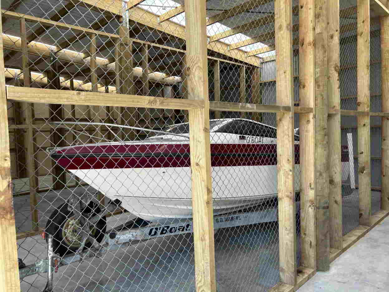 Boat inside shed
